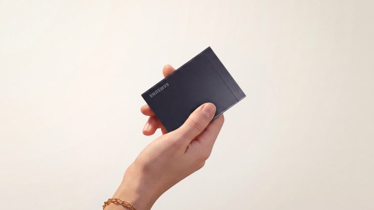 A hand holds Samsung's Portable SSD P9, the professional-workflow drive at the center of its AI-generated launch ad controversy. Photo: Samsung, via Newsshooter.