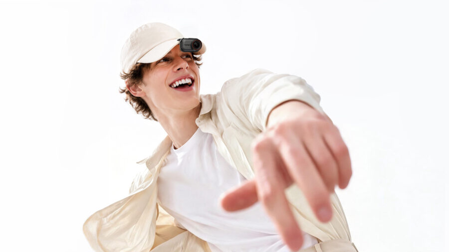Hohem Eyepic camera clipped to a cap for hands-free wearable shooting