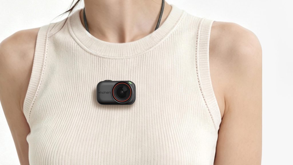 Hohem Eyepic camera worn as a pendant on a cord, lifestyle shot