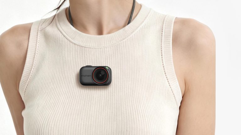 Hohem Eyepic camera worn as a pendant on a cord, lifestyle shot