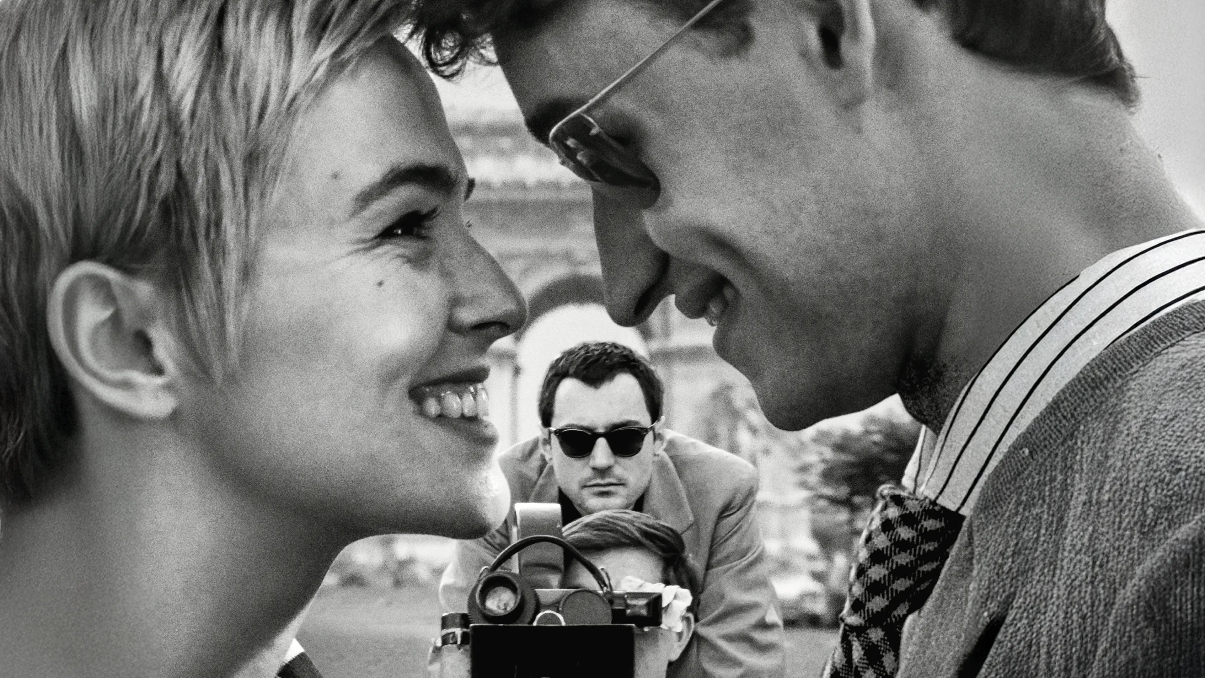 Guillaume Marbeck as Jean-Luc Godard filming Zoey Deutch as Jean Seberg and Aubry Dullin as Jean-Paul Belmondo on the set of Nouvelle Vague (2025)