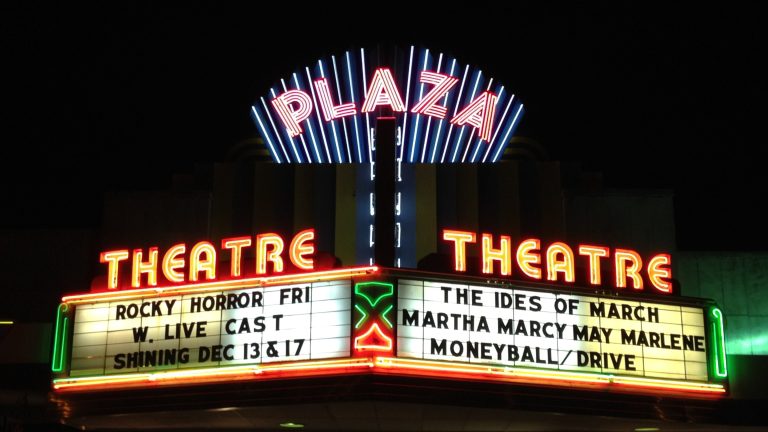 Neon marquee of the Plaza Theatre in Atlanta, the venue hosting the Post Atlanta Conference