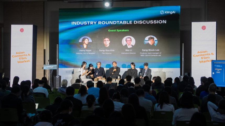 Industry roundtable at the Asian Contents & Film Market in Busan with director Sung-Soo Kim and other panelists on stage in front of a Kling AI screen